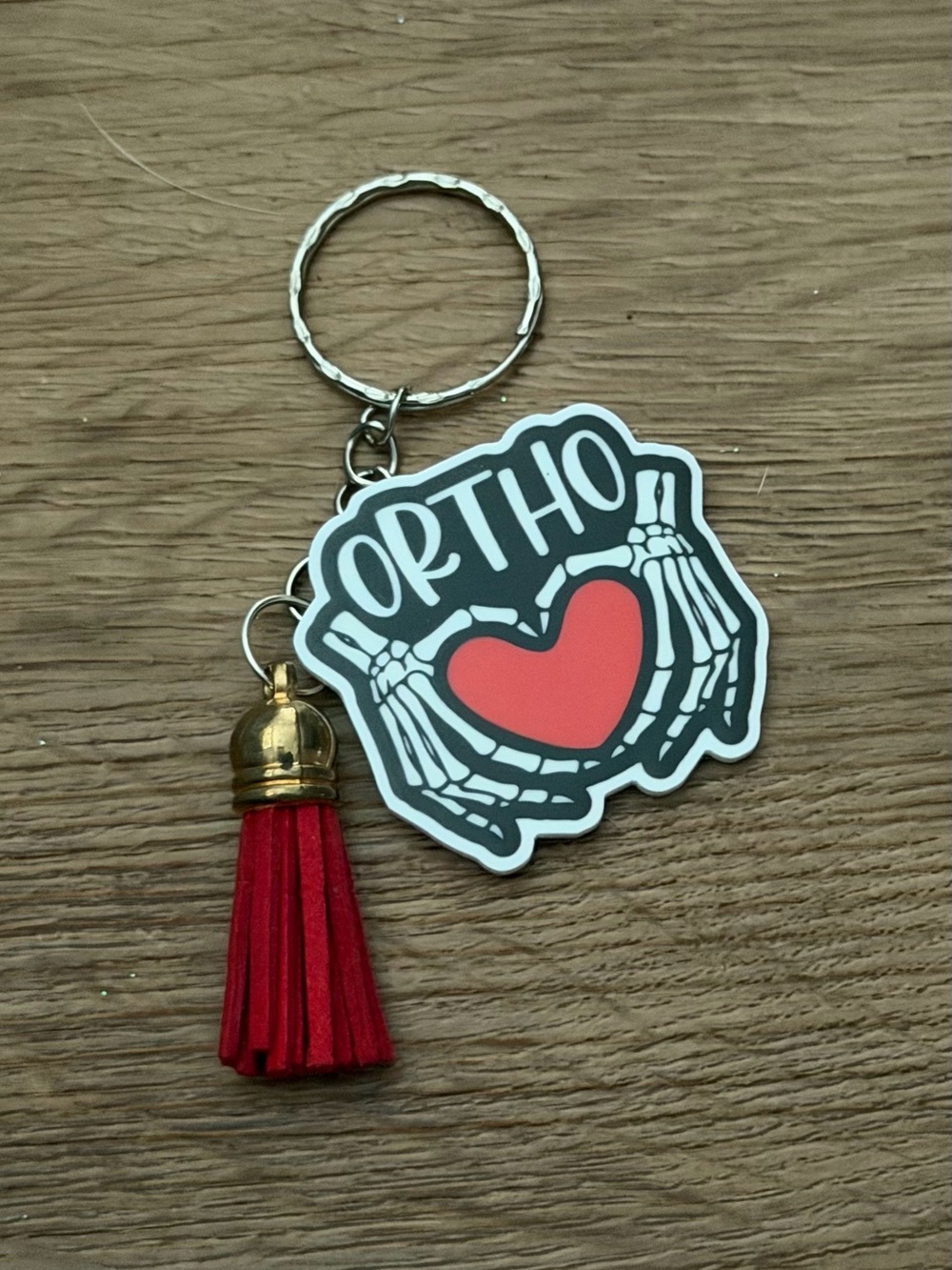 ORHTO Skeleton Hands Keychain with Red Heart and Tassel